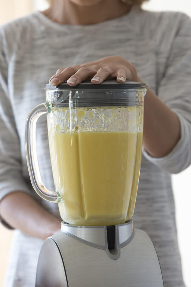 A smoothie of bananas is being blended