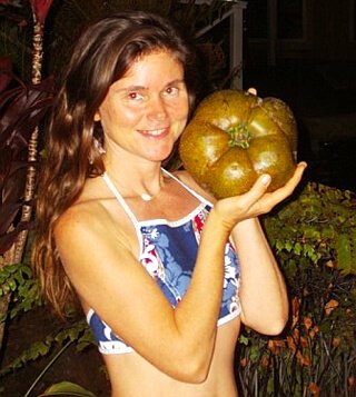 Janie Gardener poses while holding food in 2006