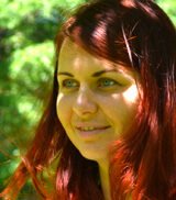 Anna Chmielewska smiles while outside