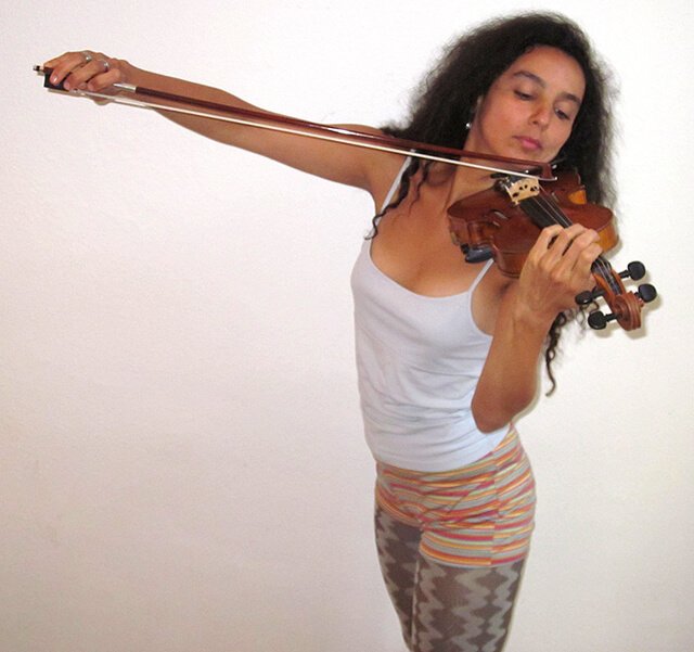 Eva Fruit plays a violin