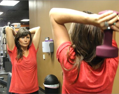 Megan Elizabeth exercises her triceps