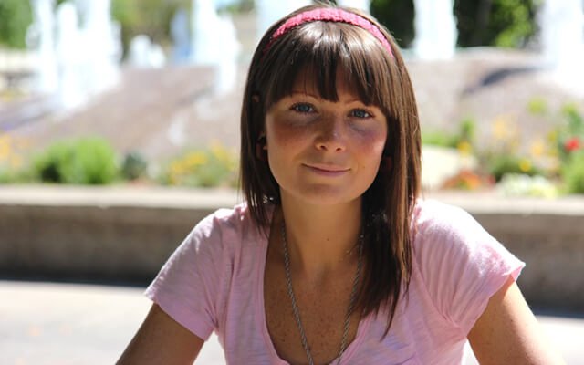 Megan Elizabeth smiles outside