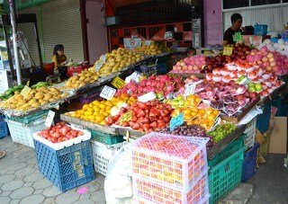 Brightly colored fruits tease the eye at Muang Mai Market in Chiang Mai, Thailand