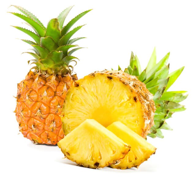 Sliced pineapple against white background