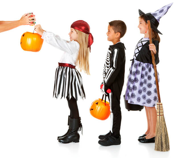 Trick-or-treaters stand in line