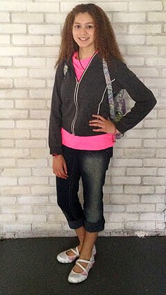 Miliany Bonet stands with a hand on her waist