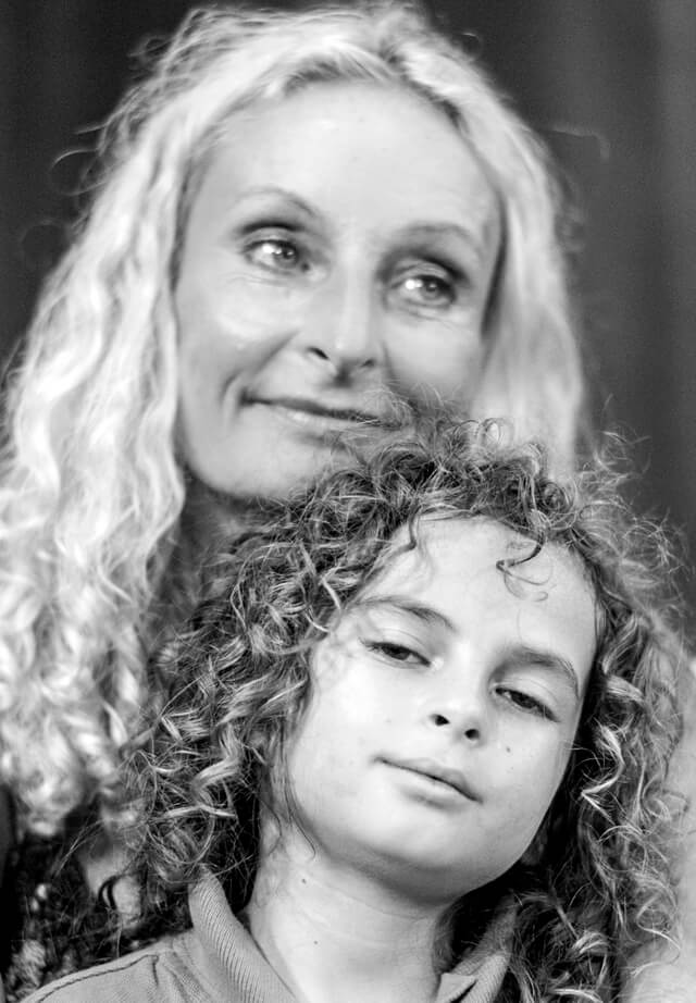 Anne and Cappi Osborne pose for a black-and-white photograph