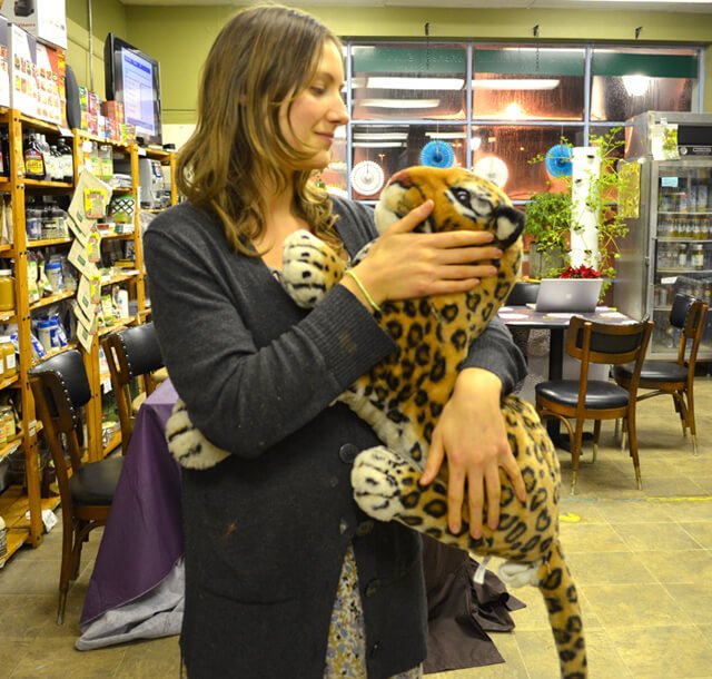 Julie Kersey playfully holds a stuffed tiger at Arnold's Way in Lansdale, Pennsylvania