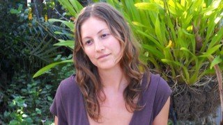 Julie Kersey posing in a garden