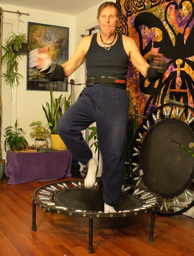 Arnold Kauffman exercising on a rebounder