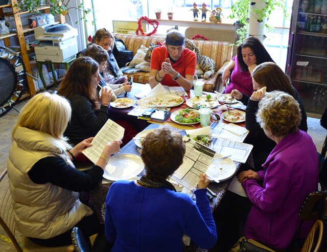 Arnold Kauffman talks to a group of women at Arnold's Way