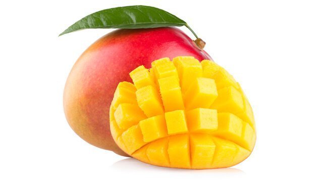 One whole mango and a cut half of mango against a white background