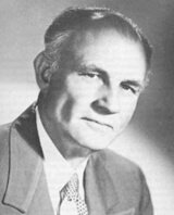 Headshot of Herbert M. Shelton