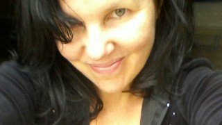 Closeup of Joy King, wearing a black shirt