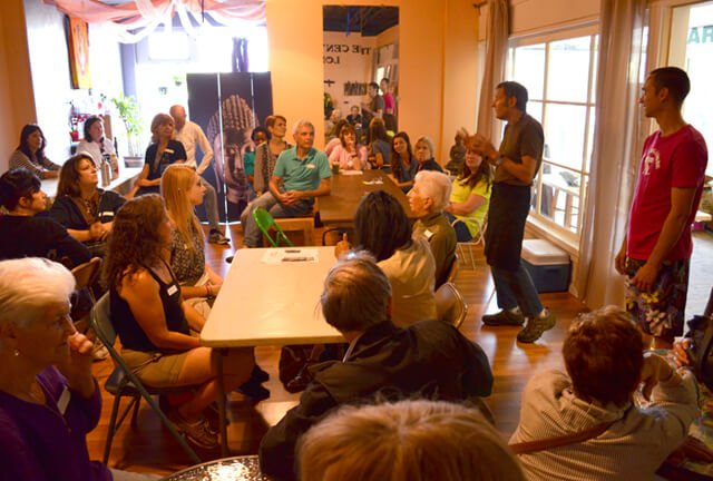 Arnold Kauffman addresses the Arnold's Way potluck crowd in The Center for Longevity on May 17, 2014