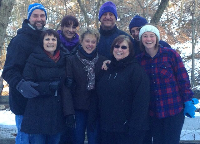 Irene Bojczuk poses with a group from a coaching program she led in January 2013