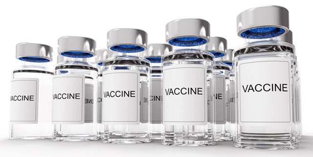 Vaccine bottles against a white background