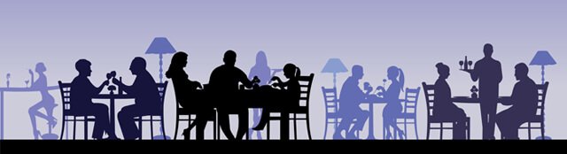 Silhouette of people eating in a restaurant