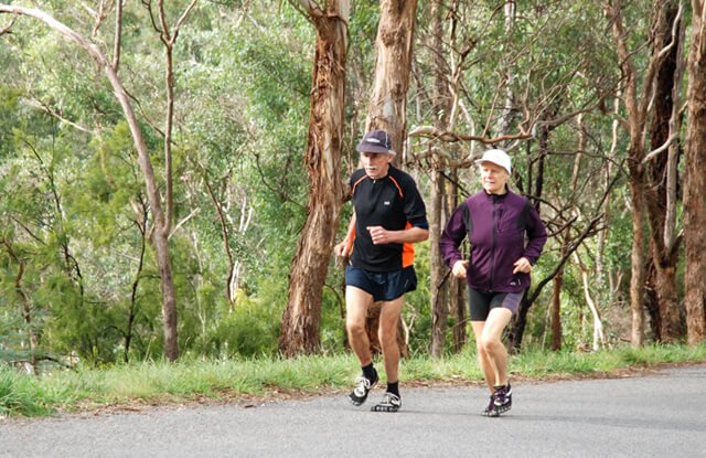 Janette Murray-Wakelin and Alan Murray running Pound Bend in Australia