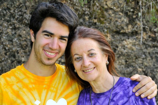 Marco and Karen Ranzi smile at a camp