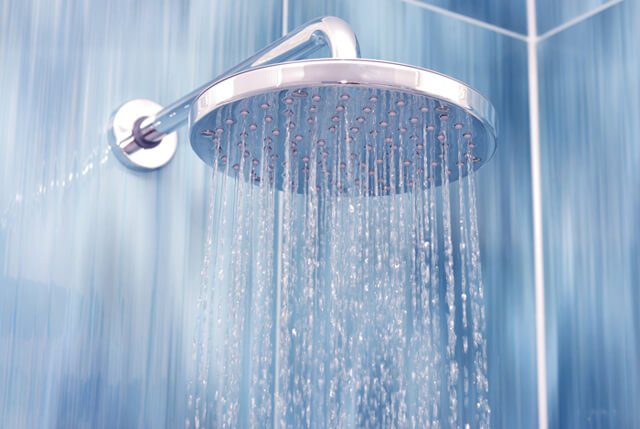 Water flowing from a showerhead