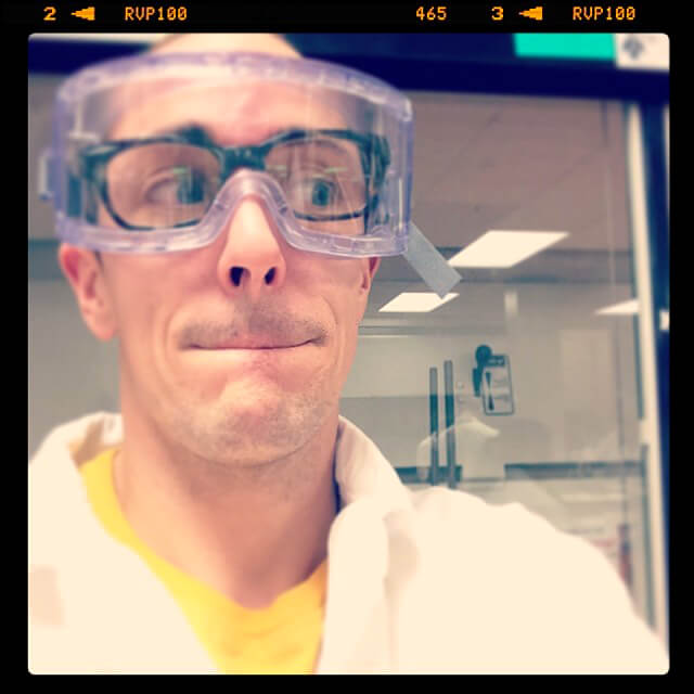 Victor VanRambutan wearing goggles in a lab