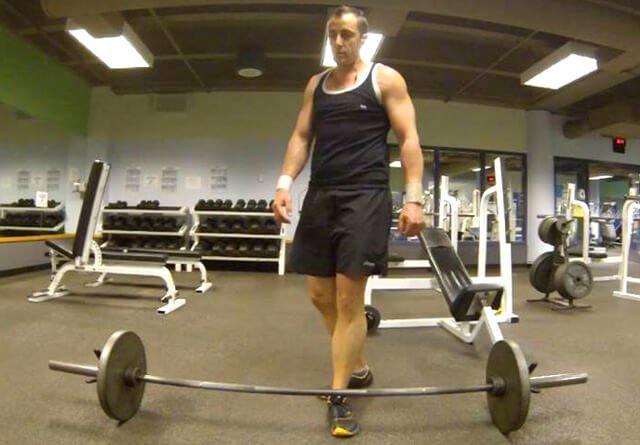Victor VanRambutan eyes a barbell to lift