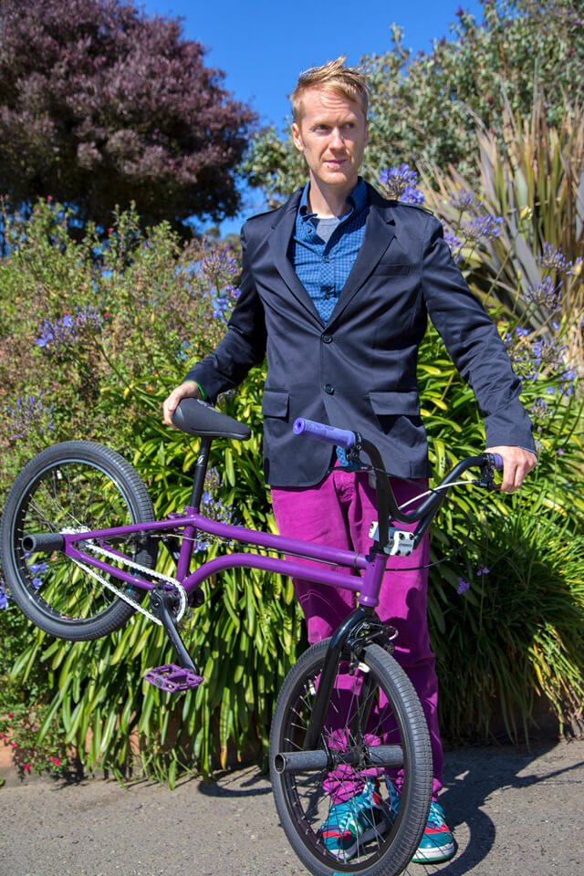 Timothy Radley lifts the back wheel of his BMX bicycle
