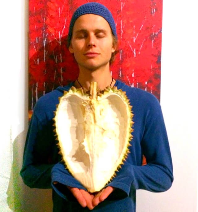 Evan Rock holds a heart-shaped durian shell