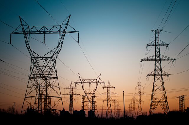 Electrical transmission towers carrying high-voltage lines