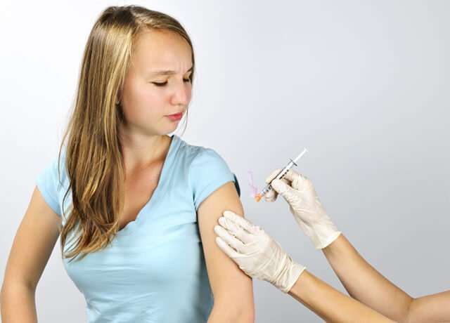 Girl getting a flu shot