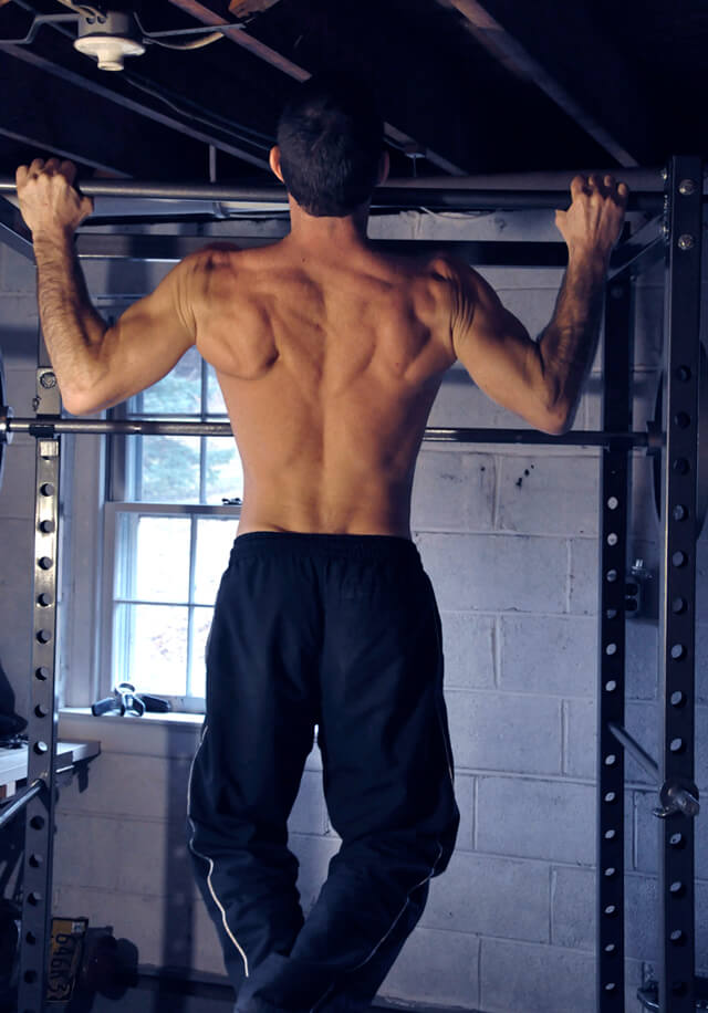 Korey Constable performs pull-ups