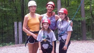 Cassandra Glynn Kutner with her family in a park