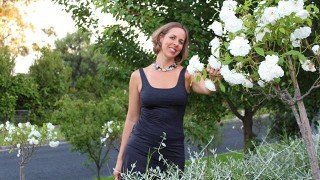 Anthea-Frances-Falkiner-touching-roses