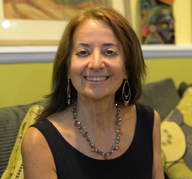 Karen Ranzi is photographed while seated.