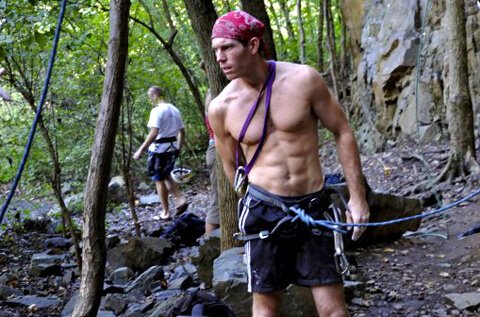 Korey Constable is photographed while rock climbing