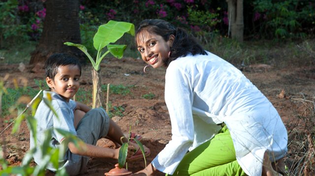 Anjali and Manikya Sanghi plant fruit trees