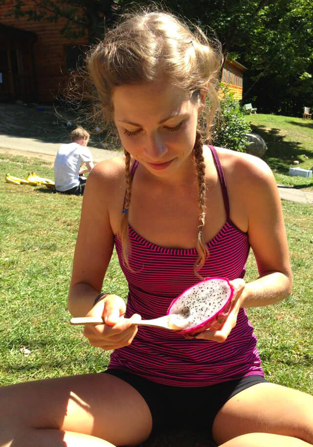 Kat Green eats a dragonfruit