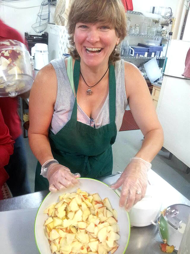 Itsy Sweeney prepares food