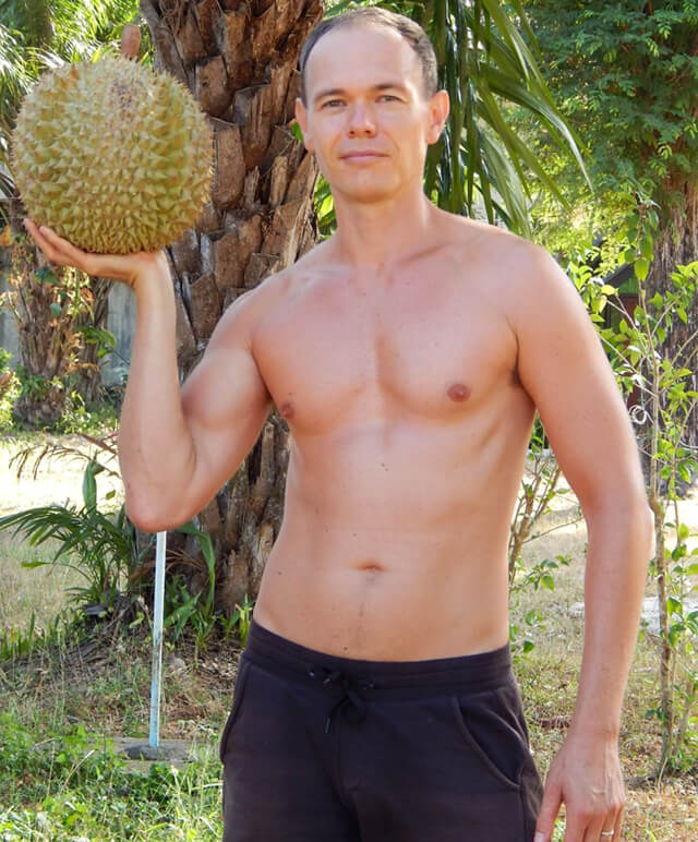 Petr Cech raises high a durian in Koh Lanta in 2014