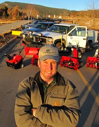 Chip Huntoon is photographed with lawnmowers
