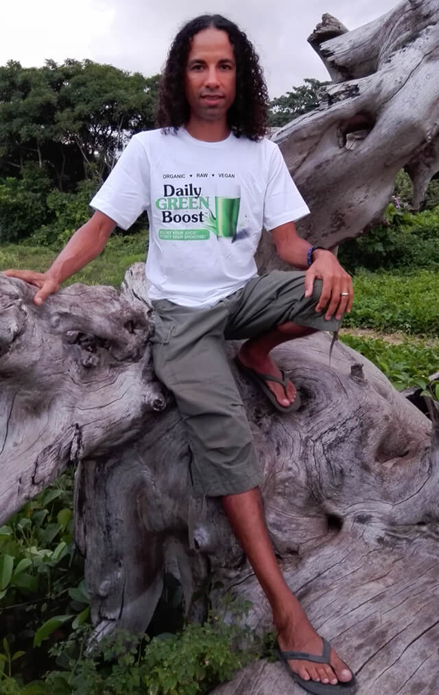 Jamie Pounds wears a Daily Green Boost T-shirt