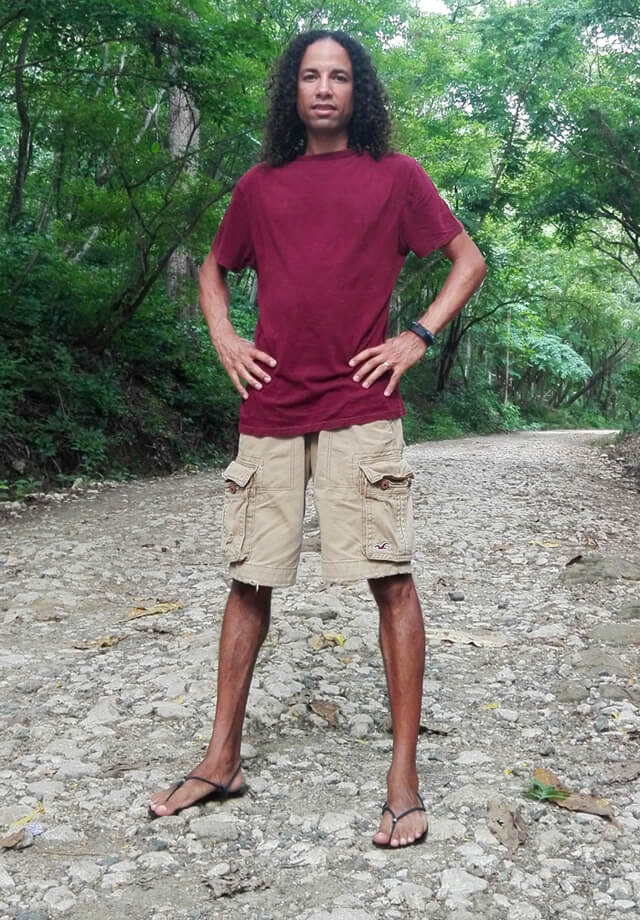 Jamie Pounds stands with hands on his waist