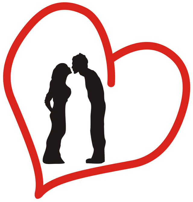 Silhouette of a man and woman kiss in a red heart