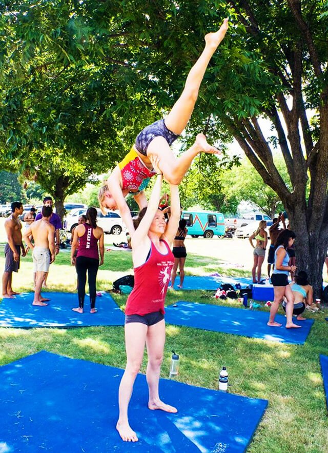 Brittany Taylor serves as the base in acro's camel position