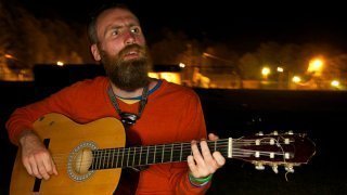 Ronnie Smith plays guitar in the dark