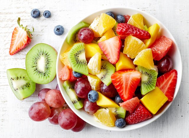 A bowl of colorful fruits