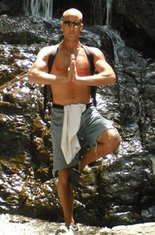 Jeff Sekerak practices yoga beside a waterfall