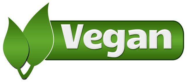 The word "vegan" adorned with green leaves
