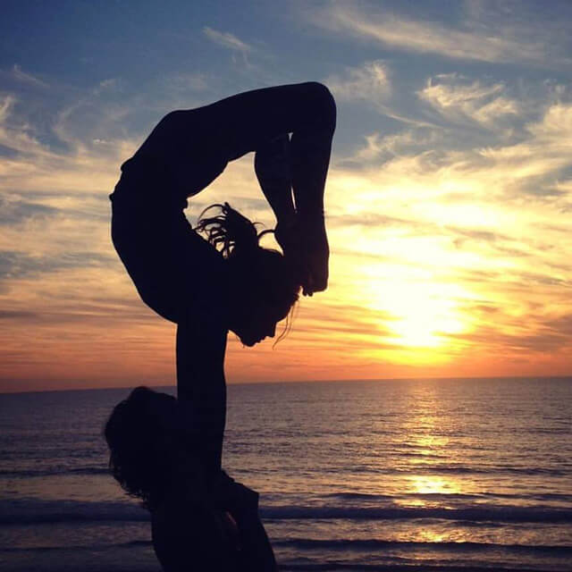 Brittany Taylor and Conor McMillen perform AcroYoga